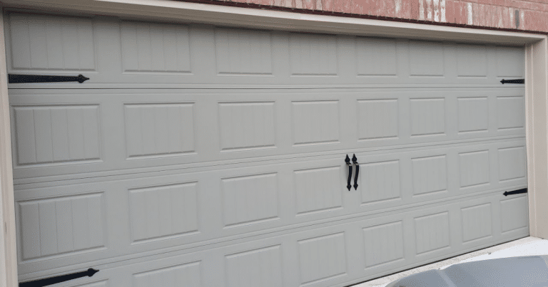 how to change garage door panels