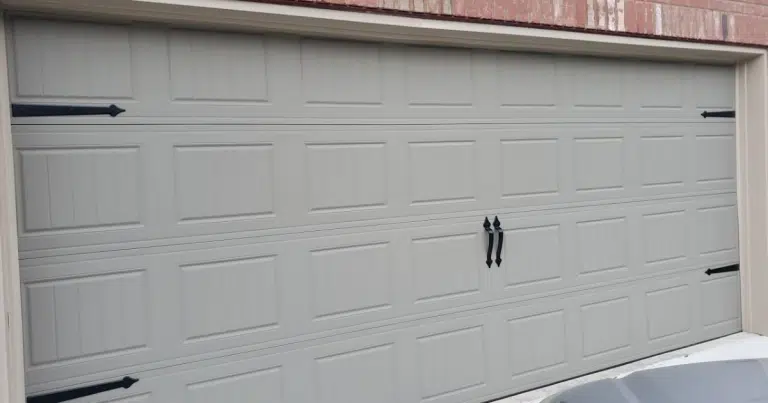 how to change garage door panels​