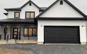 Black Garage Doors on White House